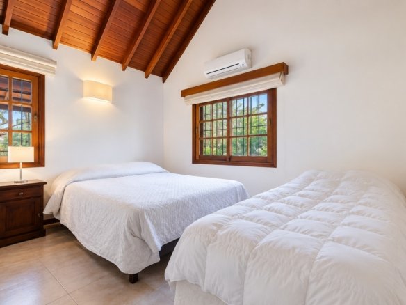 Dormitorio de Casa Playa Mansa P10 con dos camas